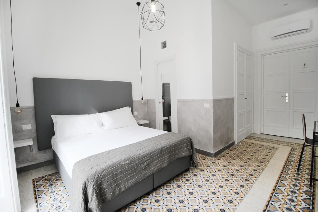 Toledostop ナポリ エクステリア 写真 A bedroom at the hotel